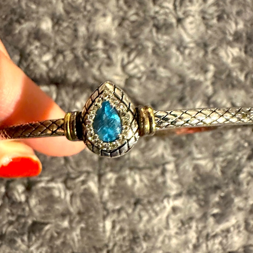 Silver and 14kt gold with diamonds and Blue Topaz stone bracelet.